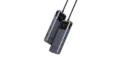 Diagonal view of a UGREEN UNO USB-C multiport hub with multiple USB ports visible and small display panels on the ends against a black background, brand shown as UGREEN Uno.